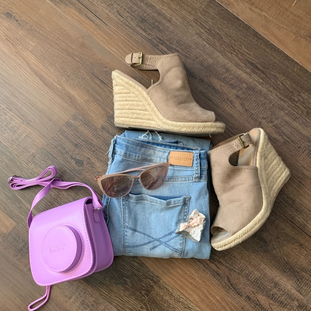 Taupe woven heeled wedges.